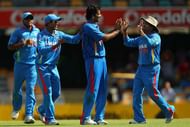 BRISBANE, AUSTRALIA - FEBRUARY 19:  Zaheer Khan of India celebrates with team mates after dismissing Ricky Ponting of Australia during game seven of the One Day International series between Australia and India at The Gabba on February 19, 2012 in Brisbane, Australia.  (Photo by Chris Hyde/Getty Images)